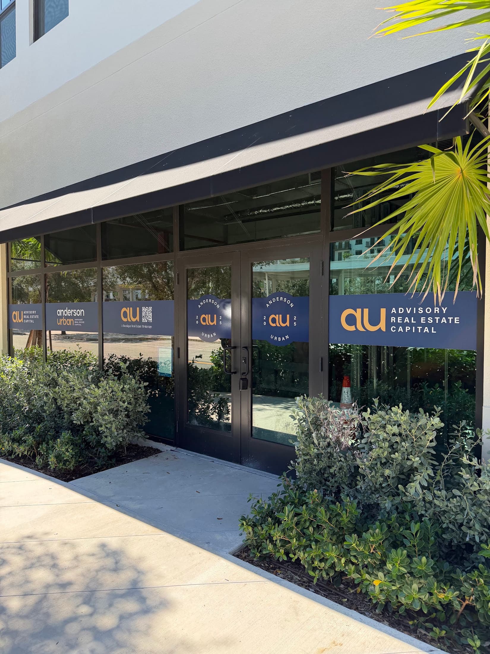 Window and door graphics for a boutique real estate brokerage for Anderson Urban