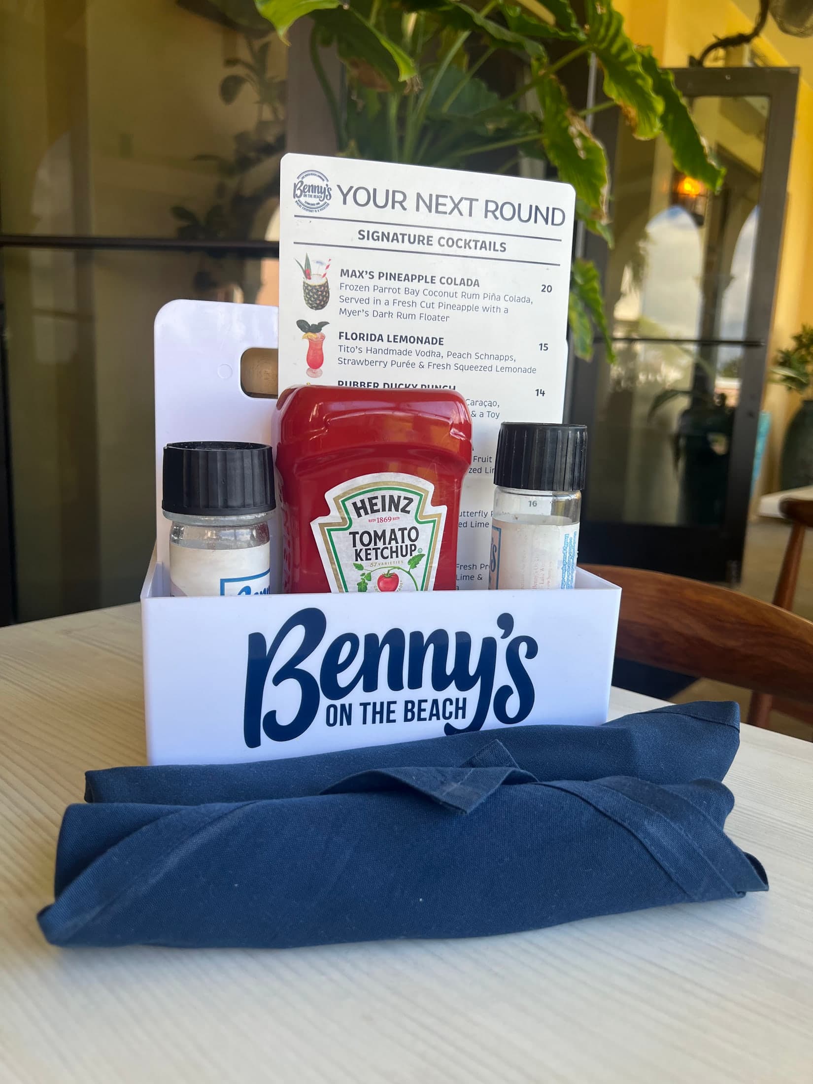 Printed cocktail menu cards and a branded table caddy for Benny's on the Beach, Lake Worth Beach, FL